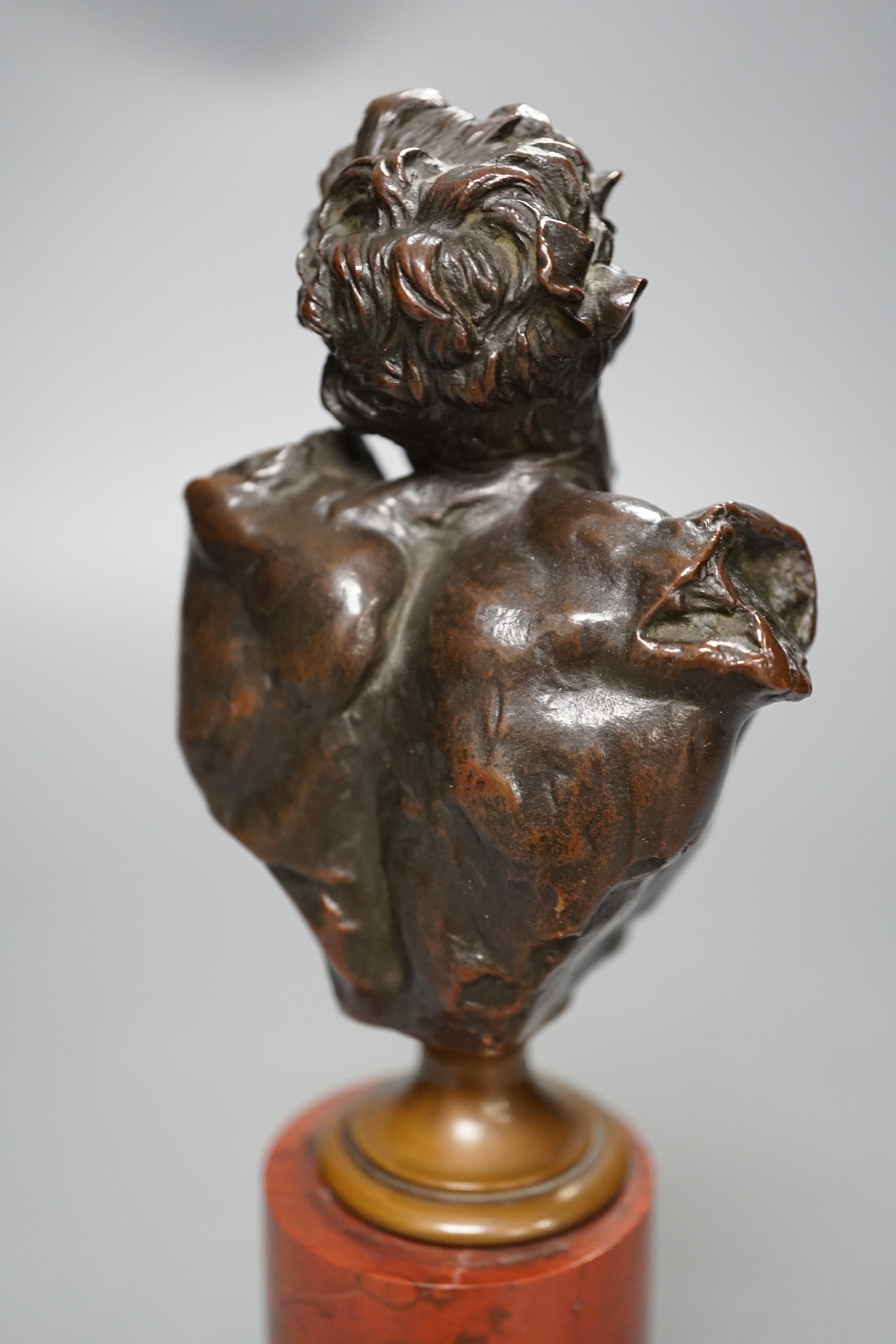A bronze bust of Dionysus on a red marble stand circa 1900, 21cm